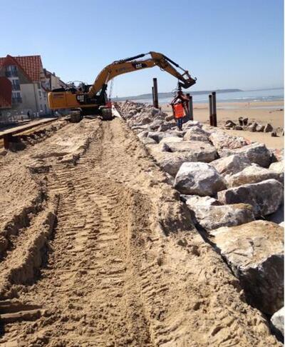 Completion of the project : placement of 3-6t riprap against the sea wall | Artelia hydraulics