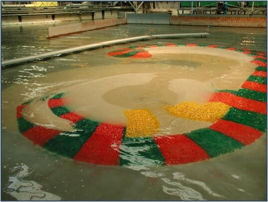 Tests in wave basin of the artificial island coastal protection| Artelia hydraulics